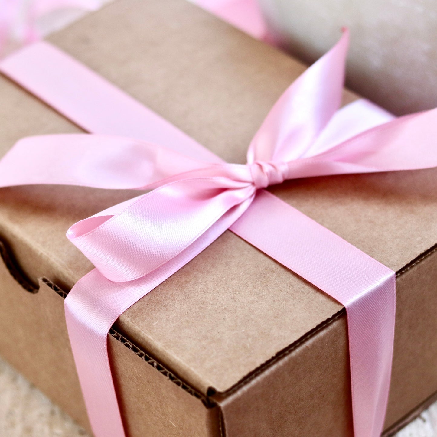 Gift set with pink ribbon