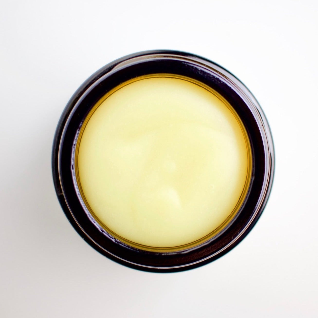 beard balm in amber jar