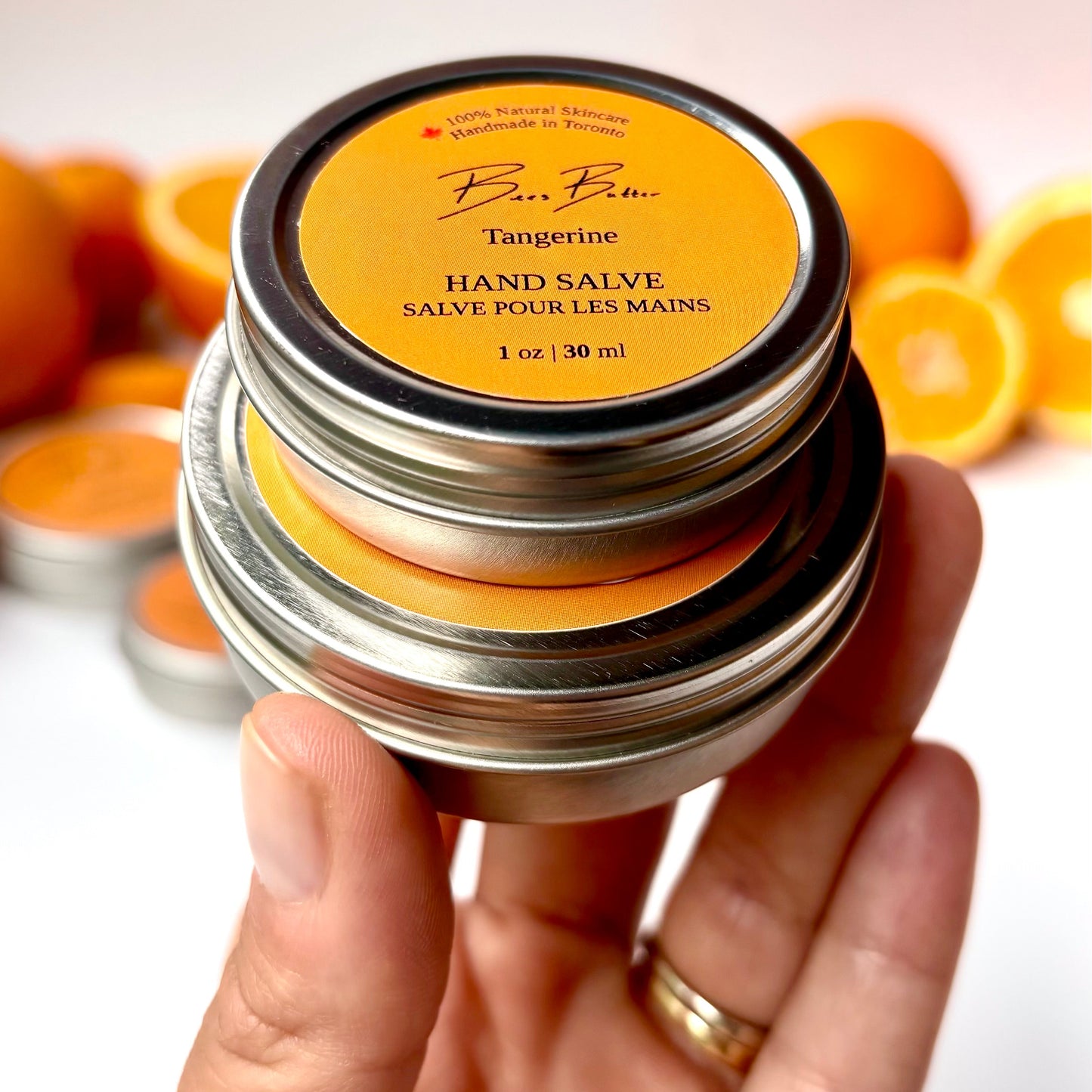 two tins of hand cream