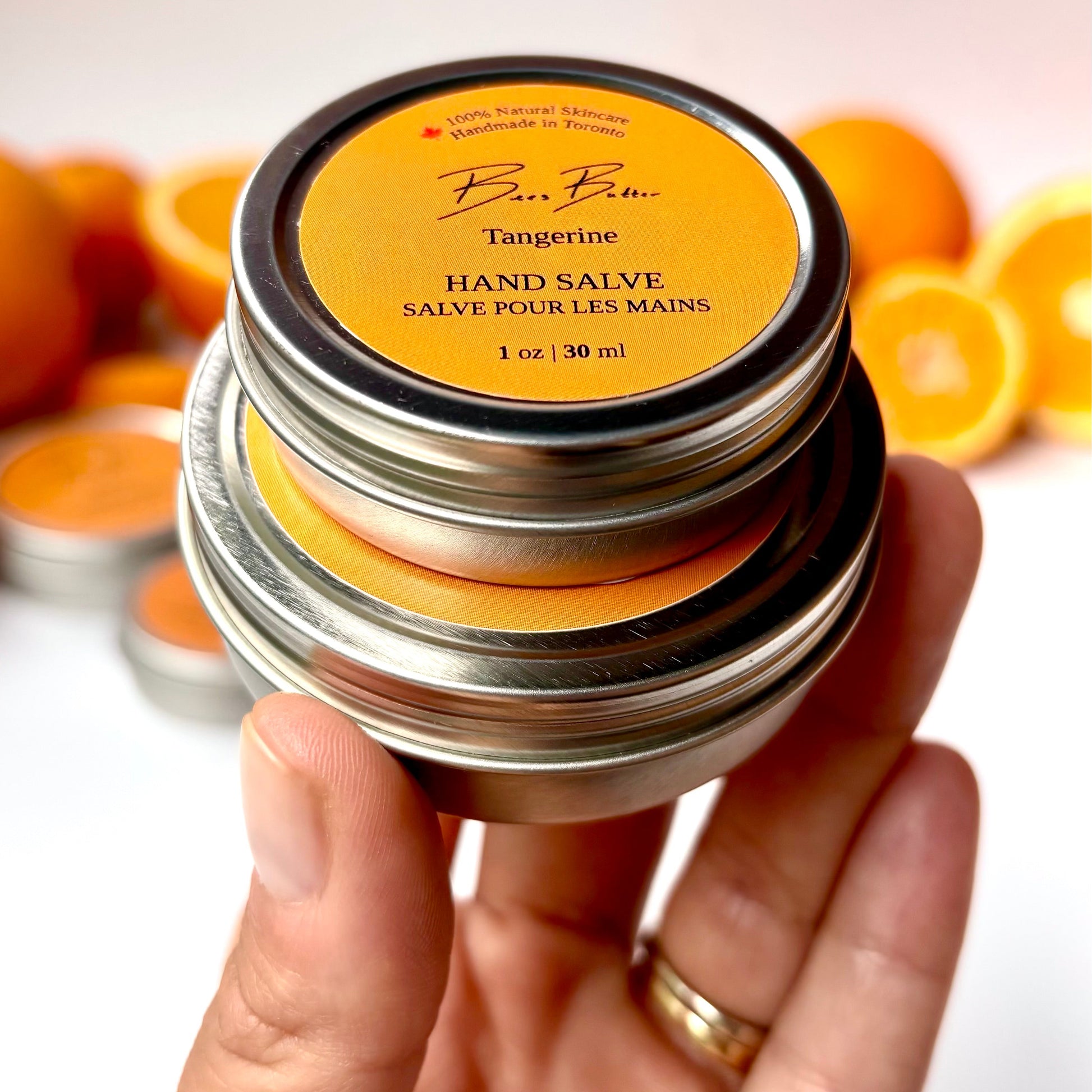 two tins of hand cream